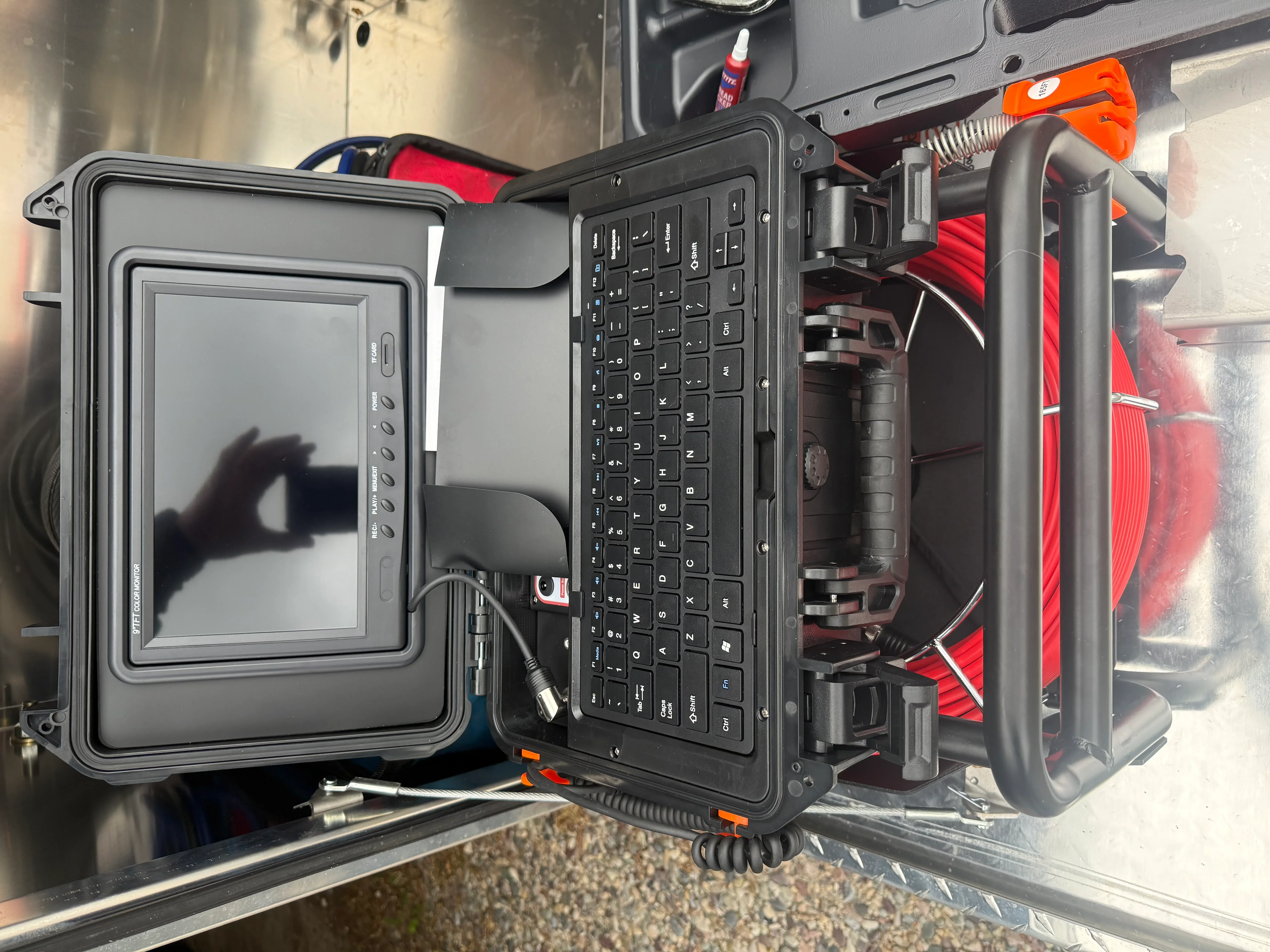 Portable septic inspection case with monitor, keyboard, and diagnostic camera equipment